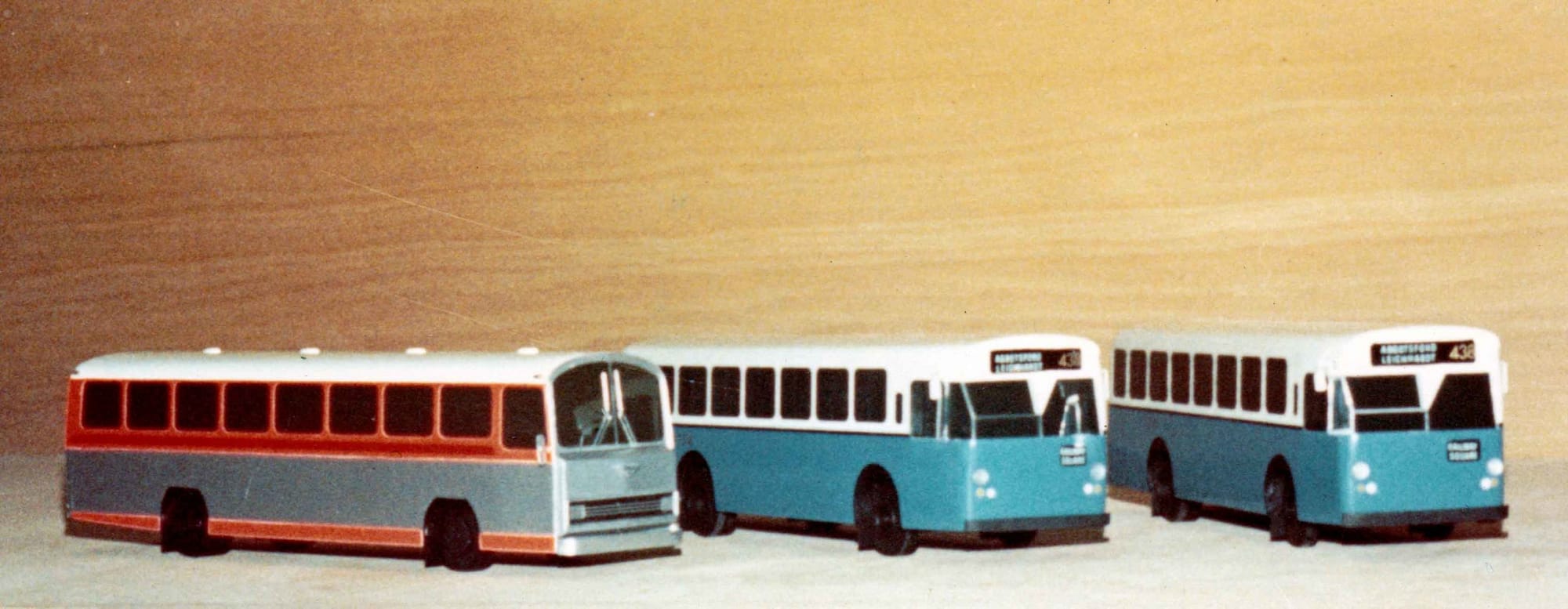 Three single-decker buses