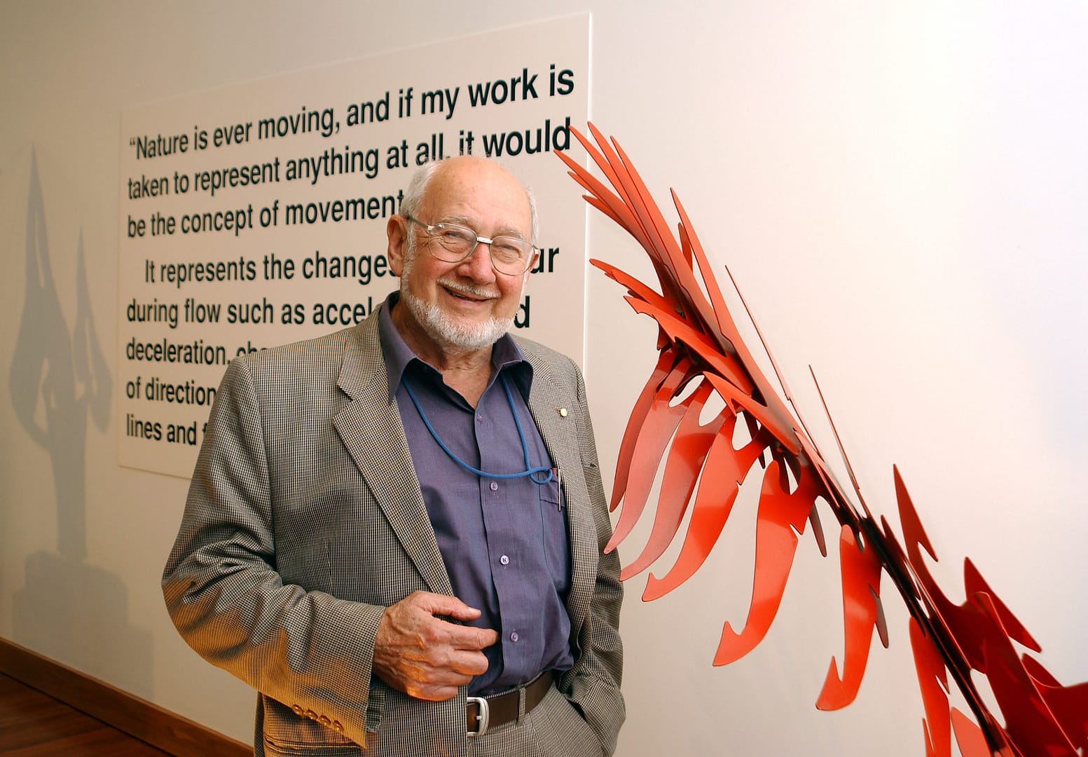 Errol Davis in 2002 with Red Feathered Friend, 1986, stainless steel