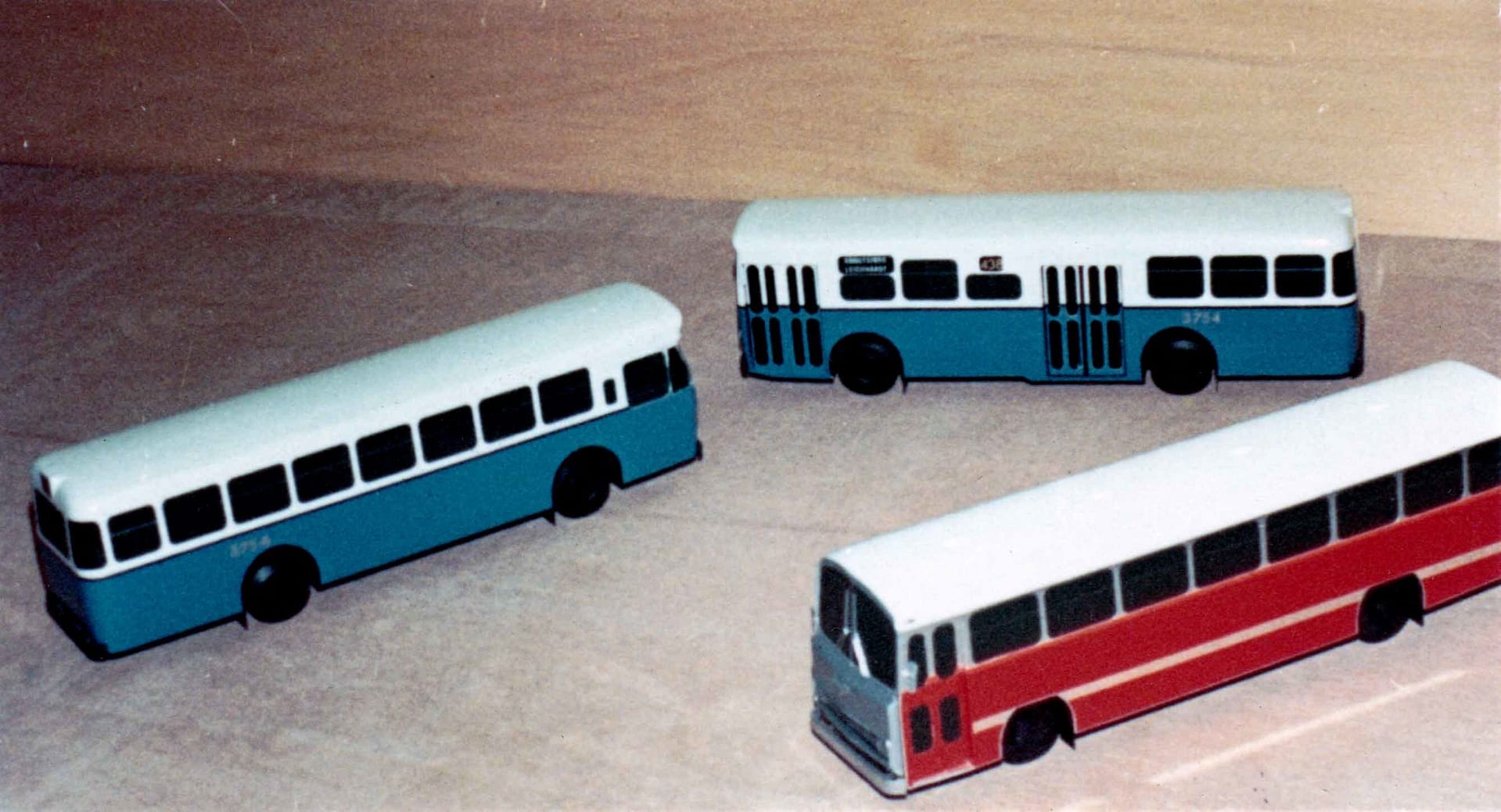 Three single-decker buses